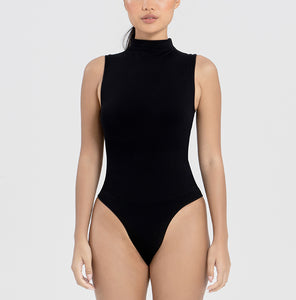 Sleeveless Turtleneck Bodysuit | This model is wearing a size XS